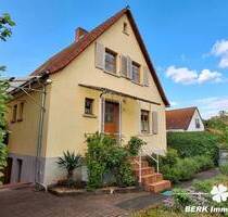 BERK Immobilien - Charmantes Einfamilienhaus mit idyllischem Garten in Wörth am Main