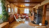 Wohnzimmer KI Bearbeitet - Einfamilienhaus mit 81,00 m&sup2; in Wörth am Main zum Kaufen