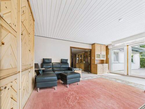 Wohnzimmer mit Blick zur Terrasse - 