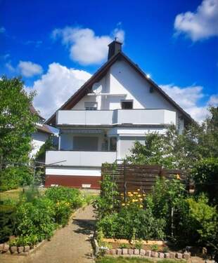 Außenansicht - Attraktive 4-Zimmerwohnung mit großem Balkon und Einbauküche in Niestetal-Sandershausen