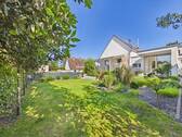 eingewachsener Garten - Ein Zuhause mit Lebensqualität: Familienfreundliches Wohnen in Bestlage mit sonnigem Garten