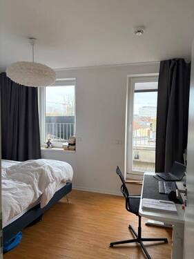 Schlafzimmer mit Arbeitsbereic - 