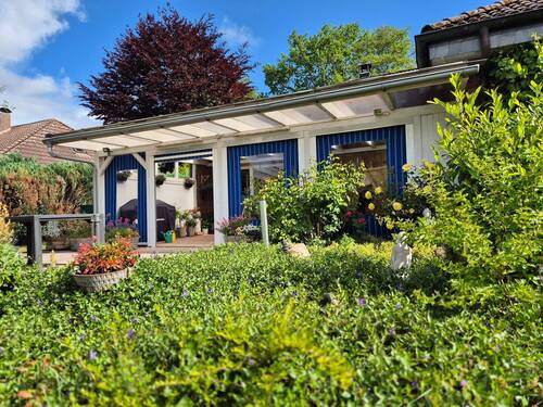 Blick zur Terrasse - Einfamilienhaus mit 134,00 m² in Barßel zum Kaufen