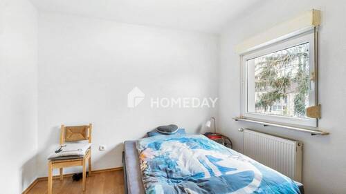 1. OG Schlafzimmer 1 - 