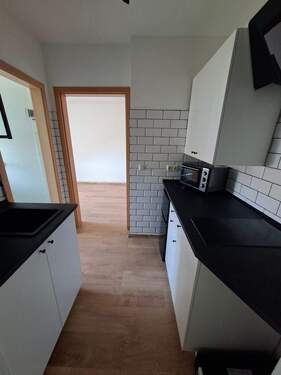 Eingangsbereich mit Küche - 