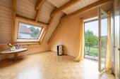 Schlafzimmer 1 mit Dachflächenfenster - 