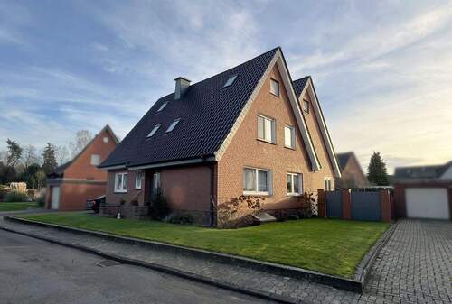 Straßen-/Seitenansicht - Jede Menge Möglichkeiten... Zweifamilienhaus mit tollem Gesamtkonzept in Mettingen