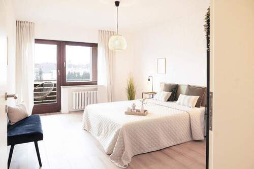 Schlafzimmer mit Balkon - 