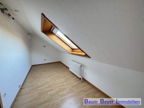 Zimmer im Dachgeschoss - 