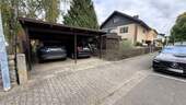 Carports - 1 Zimmer Mehrfamilienhaus, Wohnhaus in Neu-Isenburg