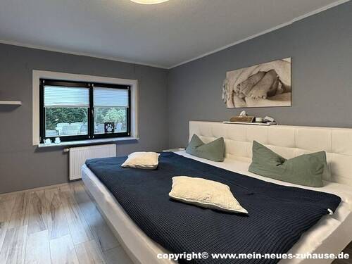 Bild 9 Schlafzimmer - 