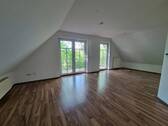 Bild 1 - Geräumige Dachgeschosswohnung in ruhiger Siedlungslage zu vermieten!