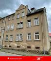 Straßenansicht - Sanierungsbedürftiges Mehrfamilienhaus