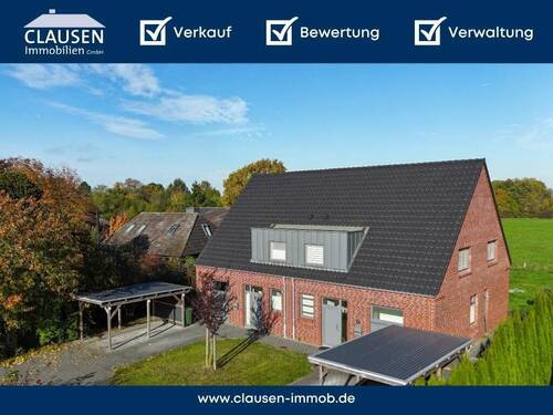 Moderne DHH in Bönebüttel - Nr. 91a - Hochwertige DHH in Feldrandlage - modern + energieeffizient!