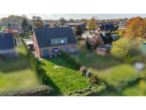 pflegeleichtes Grundstück - Doppelhaushälfte mit 140,30 m² in Bönebüttel zum Kaufen