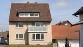 Westansicht - Solides Mehrfamilienhaus mit stabiler Vermietung und attraktivem Grundstück in Ahnatal