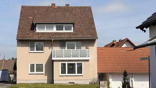 Westansicht - Solides Mehrfamilienhaus mit stabiler Vermietung und attraktivem Grundstück in Ahnatal