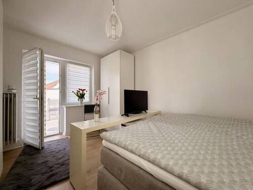 Schlafzimmer EG - Mehrfamilienhaus, Wohnhaus in Ahnatal zum Kaufen