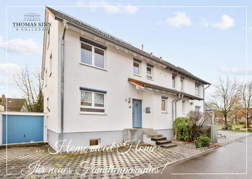 Straßenansicht - Sehr gepflegte DHH mit Garten und Garage in ruhigem Wohngebiet für Ihre Familie - sofort frei !