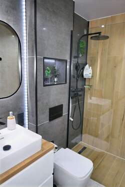 Bad mit ebenerdiger Dusche - 