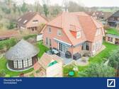 Bild 1 - Exklusives Wohnerlebnis: Luxuriöses Einfamilienhaus mit Wellnessbereich und Traumgarten