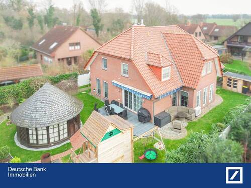 Bild 1 - Exklusives Wohnerlebnis: Luxuriöses Einfamilienhaus mit Wellnessbereich und Traumgarten