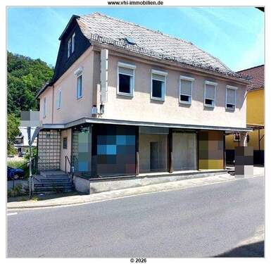 Straßenansicht - Super Objekt: Zirka 39.000 Euro Mieteinnahmen!Wohn-und Geschäftshaus in Aabergen- Michelbach