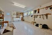 Hobbyraum im UG mit Ausgang in Garten - 