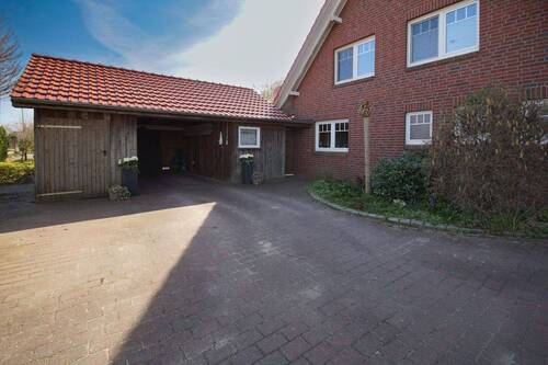 Carport - Einfamilienhaus mit 130,30 m&sup2; in Blomesche Wildnis zum Kaufen