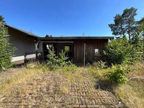 Vorderansicht - Einfamilienhaus mit 129,90 m&sup2; in Ummern zum Kaufen