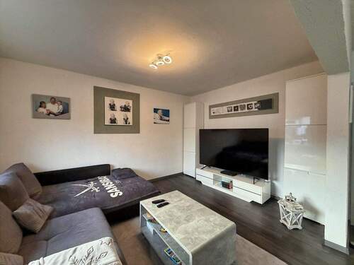 Wohnzimmer Bild 1 EG - Reihenmittelhaus mit 75,00 m² in Bochum zum Kaufen