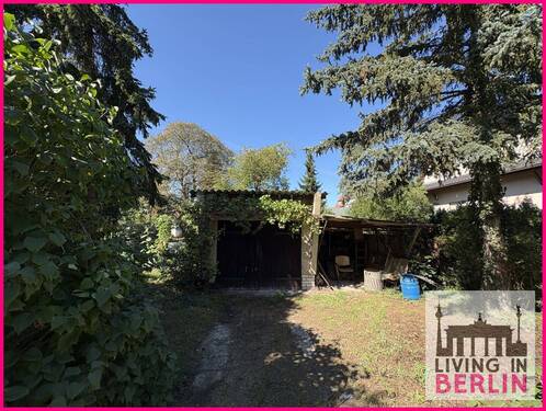 Zufahrt und Garage - 