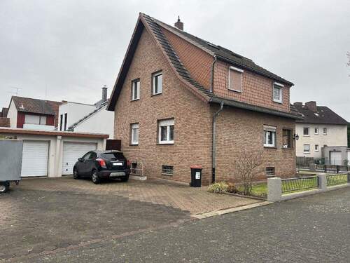 Ansicht mit 2 Garagen - 8 Zimmer Mehrfamilienhaus, Wohnhaus zum Kaufen in Paderborn