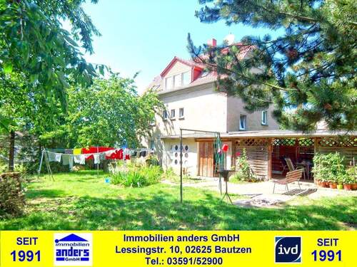 Ansicht Haus - Moderne 3-Raum-DG-Wohnung mit Garage und gemeinschaftlichen Grundstück bei Bautzen