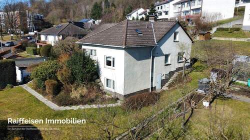 RAIBA IMMO - Wohnen am Sonnenhang 1 - Haus aus der Luft - 