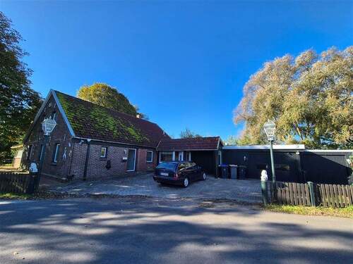 Straßenansicht - 4 Zimmer Mehrfamilienhaus, Wohnhaus zum Kaufen in Wangerland