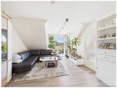 Wohnbereich - Helle Dachgeschosswohnung mit Studio und zwei Balkonen - Urbanes Wohnen in bester Lage