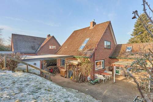 Gartenansicht Rückseite - Einfamilienhaus mit 100,00 m&sup2; in Eutin zum Kaufen