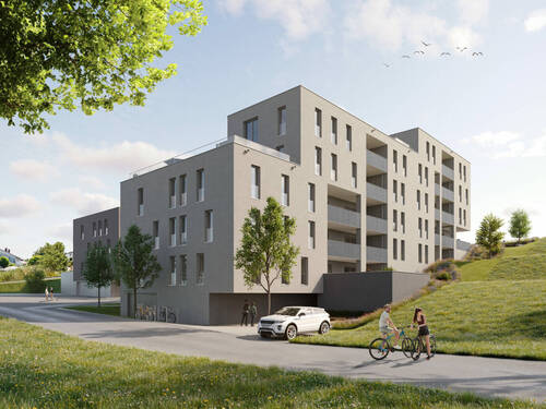 Modernes Wohnhaus mit Balkonen und Tiefgaragenzufahrt, umgeben von Grünflächen und Bäumen, mit Menschen auf Fahrrädern und einem geparkten Auto. - B.3.5 