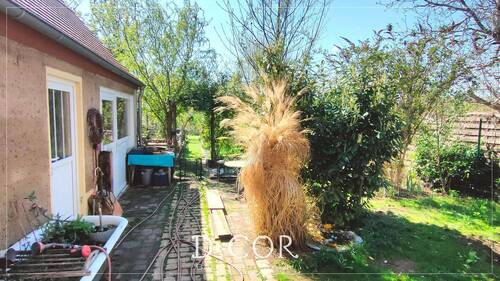 Garten und Nebengebäude (Waschhaus, Werkstatt, Fahrradraum) - 