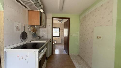 Wohnhaus OG Küche Wohnung - 