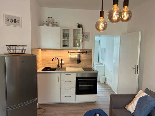 Wohn/Küchenbereich - Stylishes vollmöbliertes Apartment 
