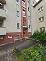 Hinterausgang - Etagenwohnung mit 50,30 m&sup2; in Altenburg zur Miete