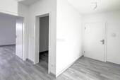 Flur, HWR und Wohnzimmer - Etagenwohnung mit 85,00 m² in Wrestedt zum Kaufen