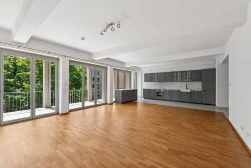 Wohnzimmer mit Wohnküche - 