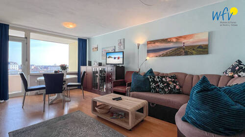 Wohnraum - Direkt an der Strandpromenade: Modernes Ferienappartement zum Verkauf!