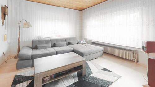 Wohnzimmer - Einfamilienhaus mit 125,70 m&sup2; in Werlte zum Kaufen