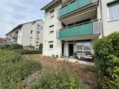 Garten - Moderne 4-Zimmer-Wohnung mit Terrasse, Garten und Tiefgaragenstellplatz
