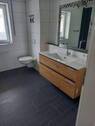 Waschbereich und Toilette - Etagenwohnung mit 97,10 m&sup2; in Bad Füssing zum Kaufen