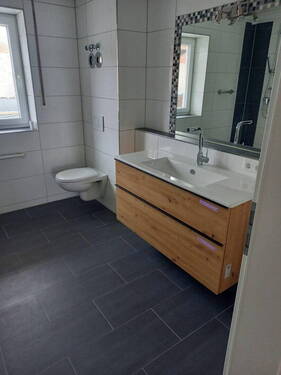 Waschbereich und Toilette - Etagenwohnung mit 97,10 m&sup2; in Bad Füssing zum Kaufen